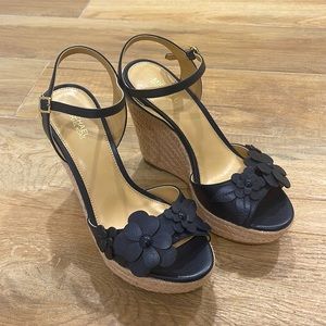 Michael Kors Flora Wedge. Brand new wedges, never worn.